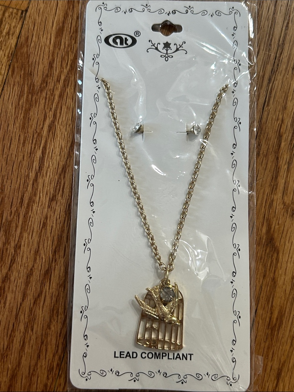 Gold Bird Cage Pendant Necklace with Bird Charm and Studded Earrings NWT